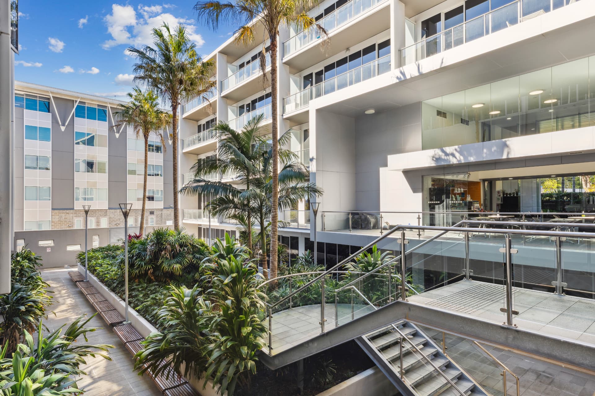 Landscaped central courtyard and building circulation.