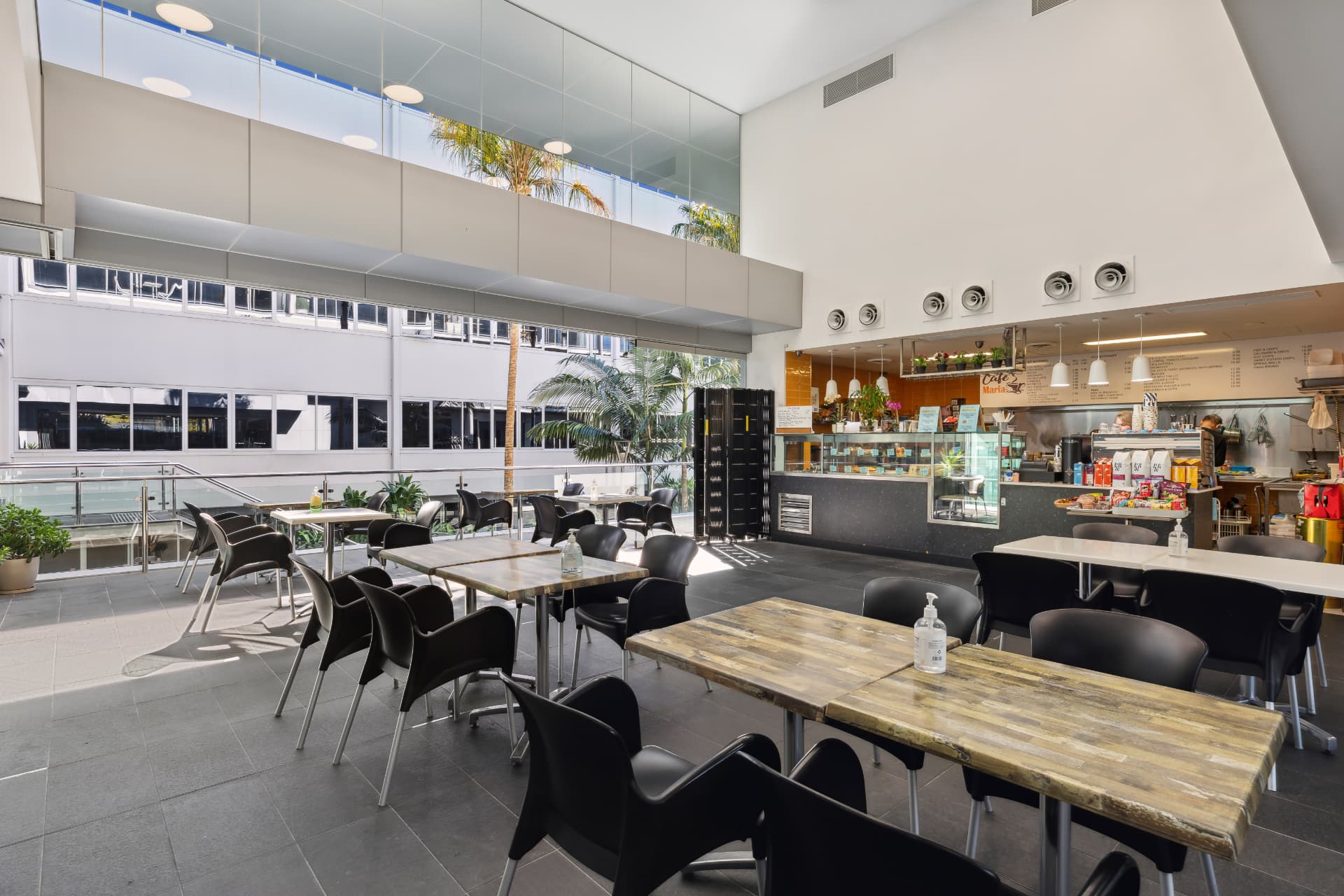 On-site café and informal meeting amenity within the 32 Delhi Road estate.
