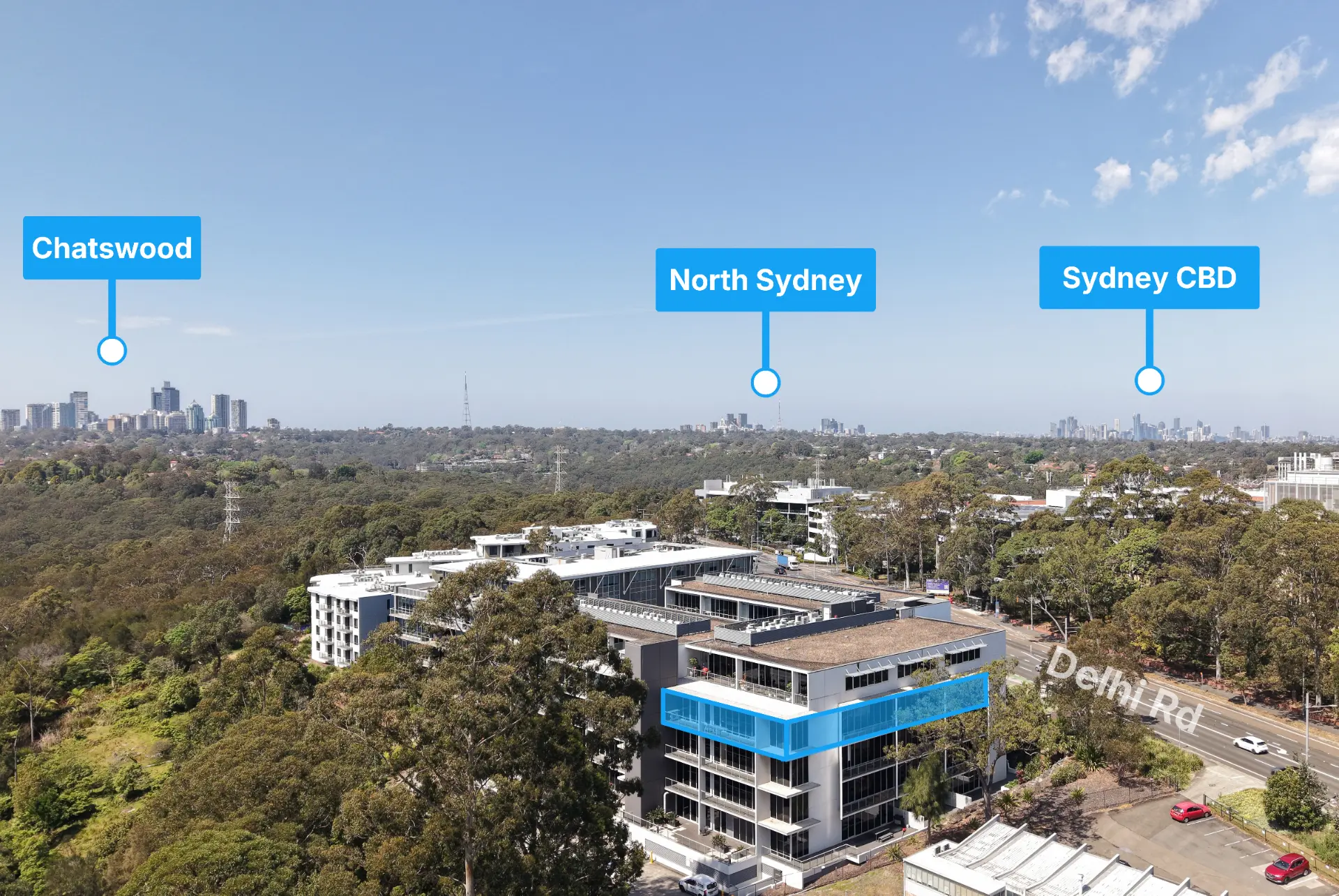 The Level 4 west wing (highlighted) within its position on Delhi Road — with Chatswood, North Sydney and the Sydney CBD on the skyline.