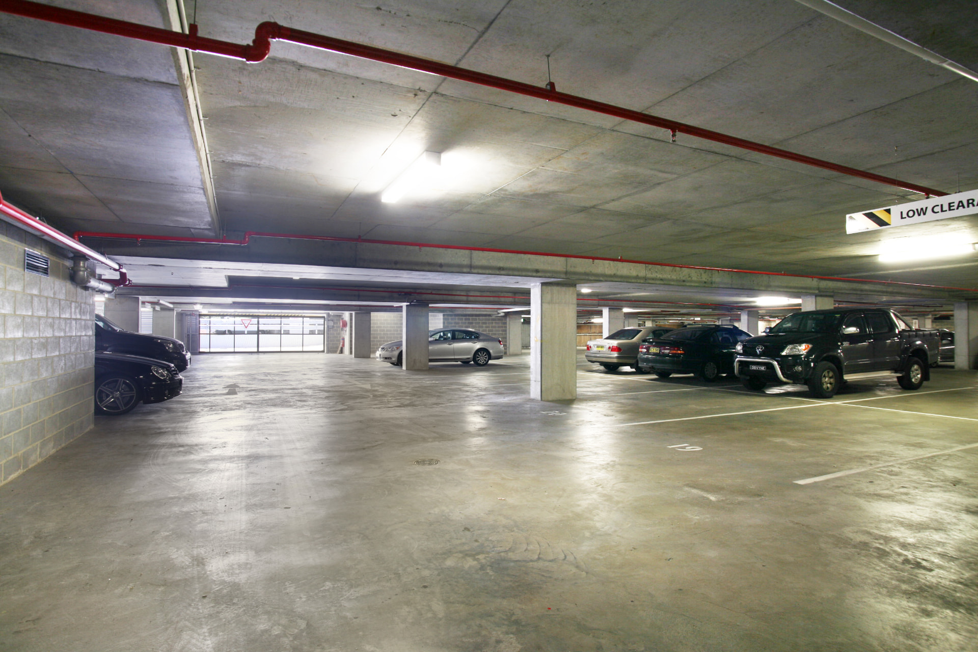 Upper basement level B1, where all 15 on-title car spaces are located.